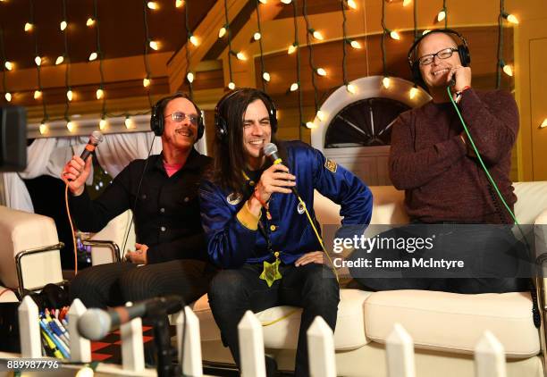 Scott Shriner, Brian Bell and Patrick Wilson of Weezer speak during an interview at KROQ Almost Acoustic Christmas 2017 at The Forum on December 10,...