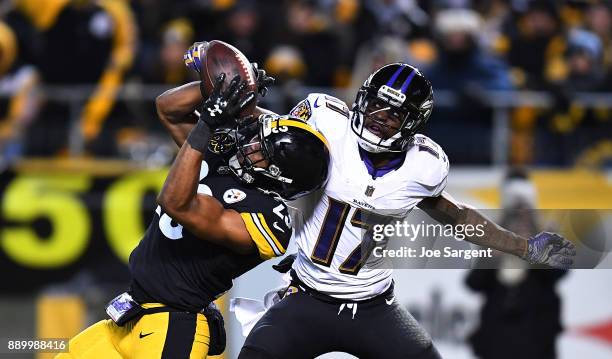 Mike Mitchell of the Pittsburgh Steelers breaks up a pass intended for Mike Wallace of the Baltimore Ravens in the second half during the game at...