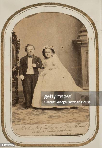 Portrait of Charles Sherwood Stratton and Lavinia Warren , better known as Mr. And Mrs. "General Tom Thumb" in their wedding costumes, ca.1865.