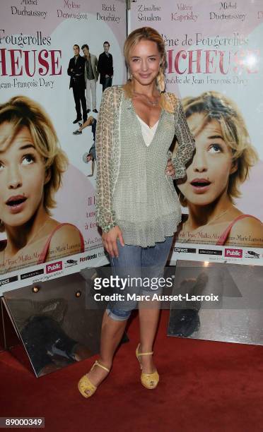 Actress Helene de Fougerolles poses at the Paris premiere of "Tricheuse" at UGC Cine Cite des Halles on July 13, 2009 in Paris, France.