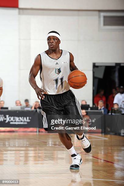 Jonny Flynn of the Minnesota Timberwolves brings the ball up court against the NBA D-League Select Team during NBA Summer League presented by EA...