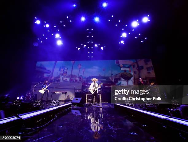 Musical group Weezer performs onstage during KROQ Almost Acoustic Christmas 2017 at The Forum on December 10, 2017 in Inglewood, California.