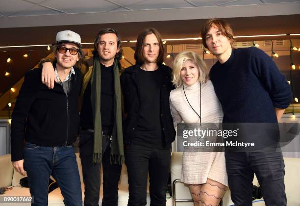 Kat Corbett poses backstage with Laurent Brancowitz, Christian Mazzalai Deck d'Arcy, Thomas Mars of Phoenix backstage during KROQ Almost Acoustic...