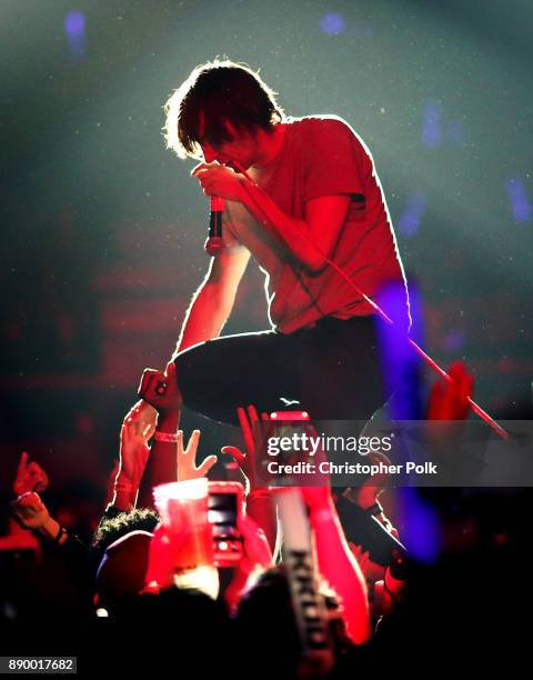 Thomas Mars of Phoenix crowdsurfs during KROQ Almost Acoustic Christmas 2017 at The Forum on December 10, 2017 in Inglewood, California.