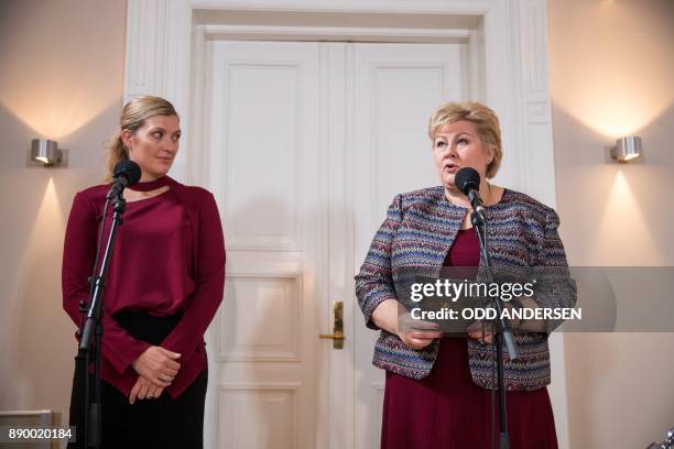 Norwegian prime minister Erna Solberg delivers a speech next to Nobel Peace Prize laureate Beatrice Fihn , leader of ICAN prior to a meeting at her...