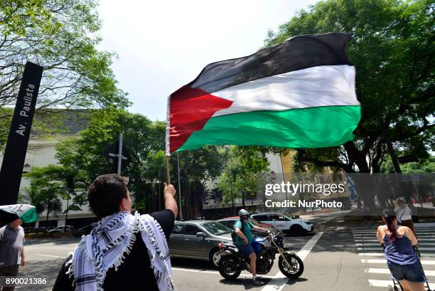 Protestors stage a demonstration against 'U.S. President Donald Trump's announcement to recognize Jerusalem as the capital of Israel', in Paulista...