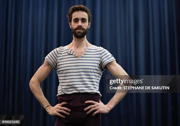 French ballet dancer of the National Opera of Paris Mathias Heymann poses during a photo session on December 6, 2017 at the Opera Bastille in Paris....