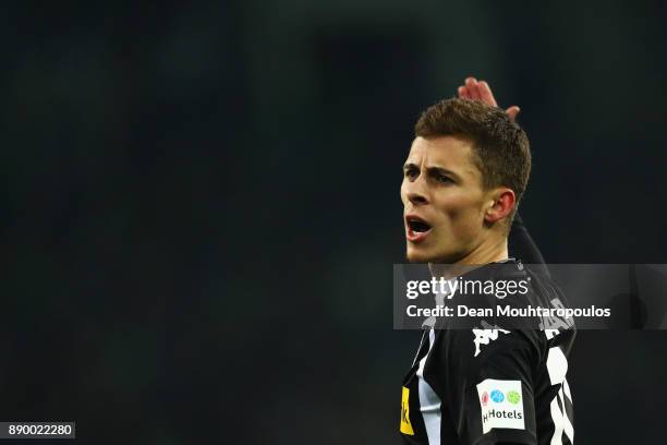 Thorgan Hazard of Borussia Monchengladbach speaks to a team mate during the Bundesliga match between Borussia Moenchengladbach and FC Schalke 04 at...