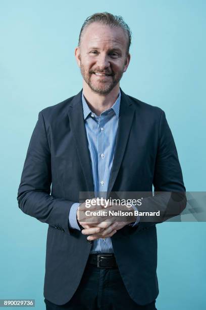 Morgan Spurlock poses during a portrait session at the 14th annual Dubai International Film Festival held at the Madinat Jumeriah Complex on December...