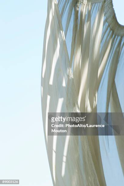 sail blowing in breeze - curtain blowing stock pictures, royalty-free photos & images