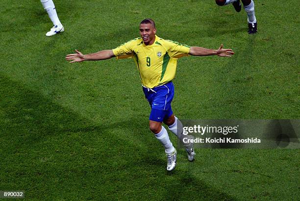 Ronaldo of Brazil celebrates scoring the winning goal during the FIFA World Cup Finals 2002 Semi-Final match between Brazil and Turkey played at the...