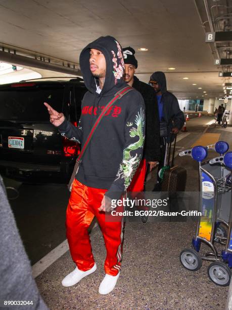 Tyga is seen at Los Angeles International Airport on December 10, 2017 in Los Angeles, California.