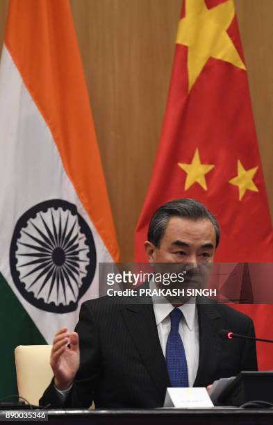Chinese Foregin Minister Wang Yi speaks during a press conference with Russian Foreign Minister Sergey Lavrov and Indian External Affairs Minister...