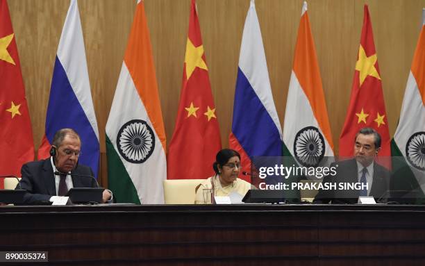 Russian Foreign Minister Sergey Lavrov , Indian External Affairs Minister Sushma Swaraj and Chinese Foregin Minister Wang Yi take part in a press...