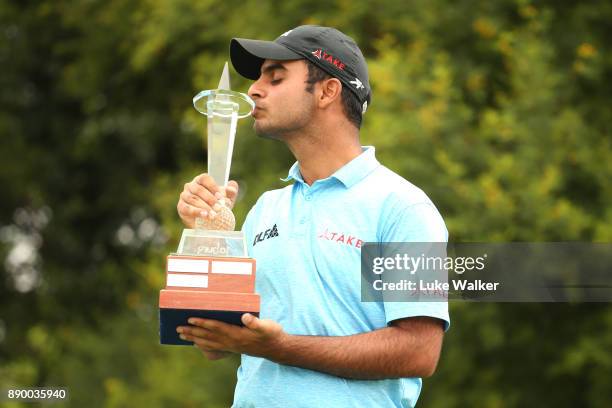 Shubankar Sharma of India with the trophy during the completion of the final round of the Joburg Open at Randpark Golf Club on December 11, 2017 in...