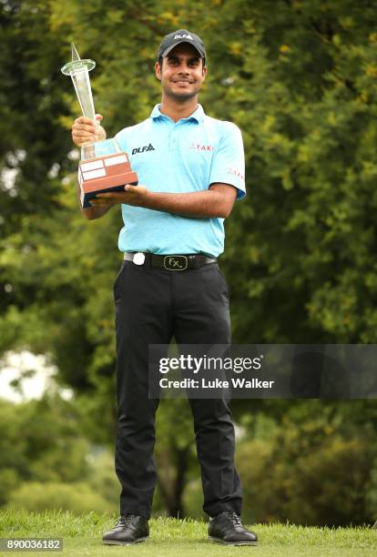 Shubankar Sharma of India with the trophy during the completion of the final round of the Joburg Open at Randpark Golf Club on December 11, 2017 in...