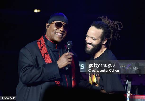 Stevie Wonder and Savion Glover perform onstage during Stevie's 21st Annual House Full of Toys Benefit Concert at Staples Center on December 10, 2017...