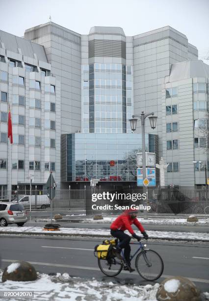 Man on a bicycle rides past the Chinese Embassy on December 11, 2017 in Berlin, Germany. Hans-Georg Maassen, the head of the German intelligence...