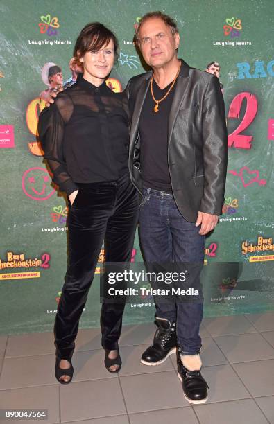 Sophie Rois and Uwe Ochsenknecht attend the 'Burg Schreckenstein 2' premiere on December 10, 2017 in Berlin, Germany.