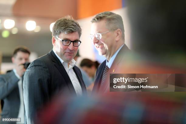 President Reinhard Grindel welcomes Eintracht Frankfurt CEO Axel Hellmann prior to the Extraordinary DFB Bundestag at Messe Frankfurt on December 8,...