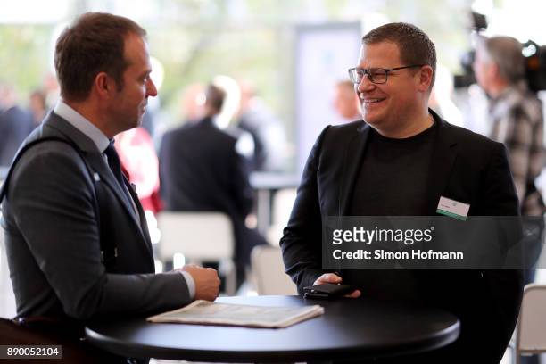 Hans-Dieter Flick and Max Eberl talk prior to the Extraordinary DFB Bundestag at Messe Frankfurt on December 8, 2017 in Frankfurt am Main, Germany.
