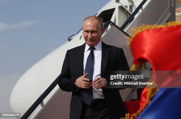 Russian President Vladimir Putin attends a welcoming ceremony at the airport on December 11, 2017 in Cairo, Egypt. Putin is having a one-day trip to...