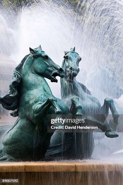 copper horse statues in fountain, montparnasse, paris, france - montparnasse stock pictures, royalty-free photos & images