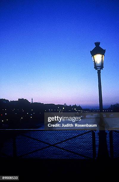 seine at night from the pont de arts bridge in paris,  france - pont de paris stock pictures, royalty-free photos & images