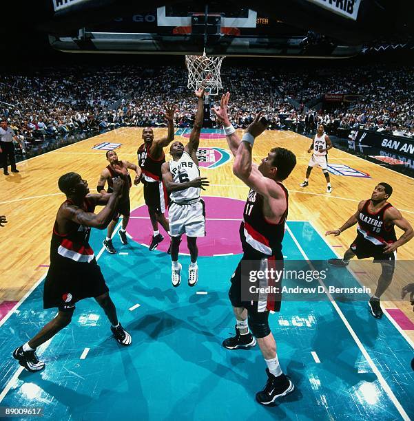 Avery Johnson of the San Antonio Spurs shoots a layup against the Portland Trail Blazers in Game Two of the Western Conference Finals during the 1999...