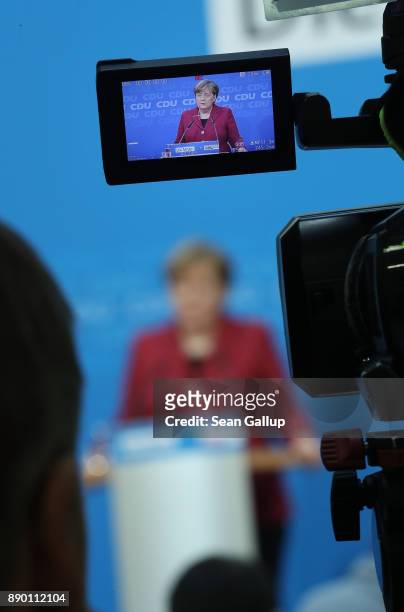 German Chancellor and leader of the German Christian Democrats Angela Merkel speaks to the media at a press conference at CDU headquarters on...
