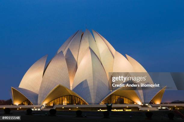 bahai lotus temple in new delhi in evening light. the temple shaped like a giant lotus flower was designed by iranian-canadian architect fariburz sahba in 1986a - lotus temple new delhi stock pictures, royalty-free photos & images