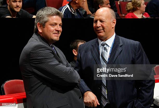 Head Coach Todd McLellan of the San Jose Sharks and Head Coach Claude Julien of the Boston Bruins share a conversation during the second day of the...