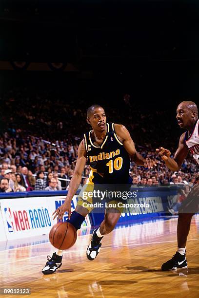 Vern Fleming of the Indiana Pacers drives to the basket against the New York Knicks in Game Five of the Eastern Conference Semifinals during the 1994...