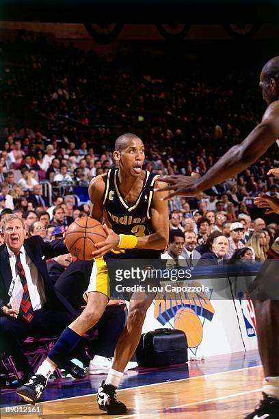 Reggie Miller of the Indiana Pacers looks to make a play against the New York Knicks in Game Five of the Eastern Conference Semifinals during the...