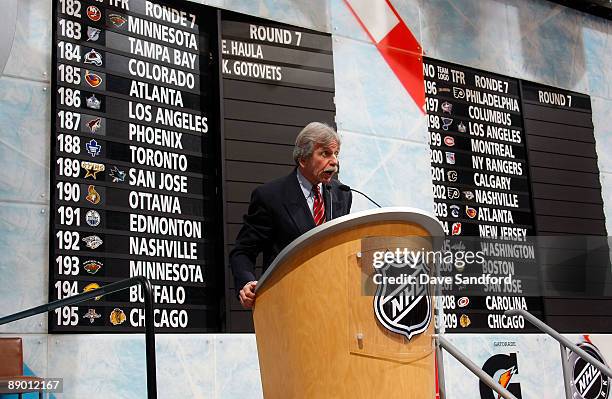 Director of NHL Central Scouting E.J. McGuire addresses the audience during round seven of the second day of the 2009 NHL Entry Draft at the Bell...