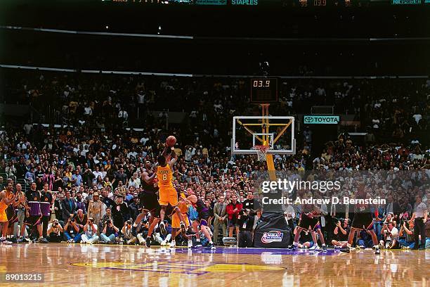 Kobe Bryant of the Los Angeles Lakers shoots a jump shot with 3.9 seconds left against the Phoenix Suns in Game Two of the Western Conference Finals...