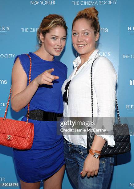 Model Doutzen Kroes and sister Rens Kroes attend a screening of "In The Loop" hosted by The Cinema Society at IFC Center on July 13, 2009 in New York...