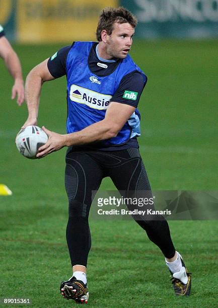 Josh Perry looks to pass during a New South Wales Blues State of Origin training session at Suncorp Stadium on July 14, 2009 in Brisbane, Australia.