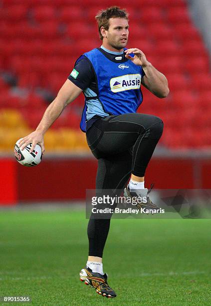 Josh Perry warms up during a New South Wales Blues State of Origin training session at Suncorp Stadium on July 14, 2009 in Brisbane, Australia.