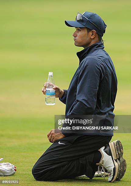 Indian cricketer S. Badrinath gestures as he attends a camp at the National Cricket Academy in Bangalore on July 14, 2009. The NCA organised a...