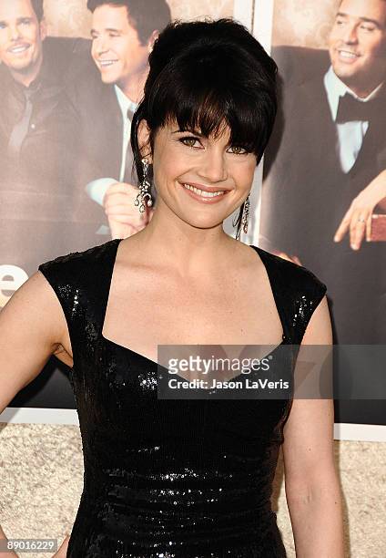 Actress Carla Gugino attends the sixth season premiere of HBO's "Entourage" at Paramount Studios on July 9, 2009 in Los Angeles, California.