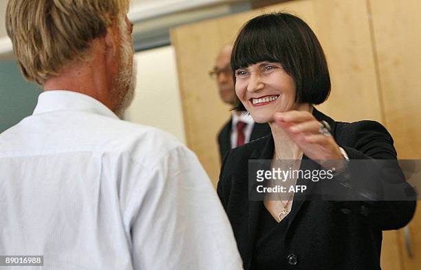 Swiss Minister of Foreign Affairs Micheline Calmy-Rey welcomes freed Swiss hostage Werner Greiner upon his arrival on July 14, 2009 at Zurich...