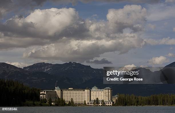 The Fairmont Chateau Lake Louise Hotel is seen from a distance across the lake in this 2009 Lake Louise, Canada, summer late afternoon landscape...