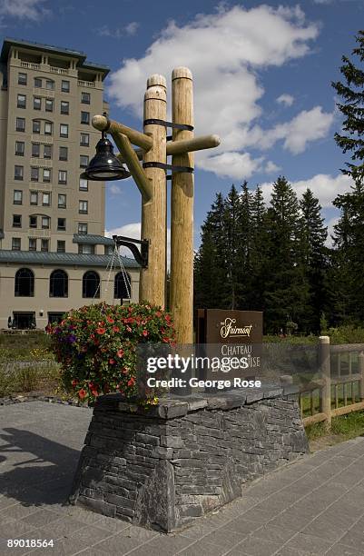 Large sign greets tourists to the Fairmont Chateau Hotel in this 2009 Lake Louise, Canada, summer afternoon landscape photo.