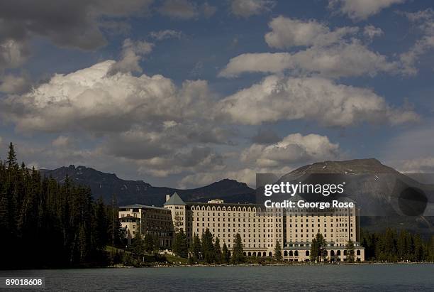 The Fairmont Chateau Lake Louise Hotel is seen from a distance across the lake in this 2009 Lake Louise, Canada, summer late afternoon landscape...