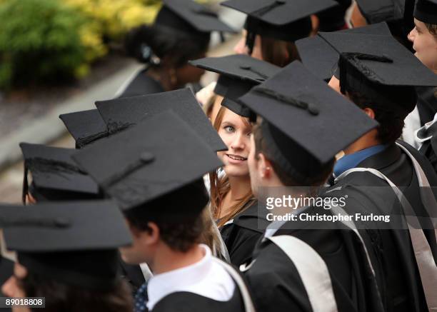 Students at the University of Birmingham pose for a group photograph as they take part in their degree congregations on July 14, 2009 in Birmingham,...