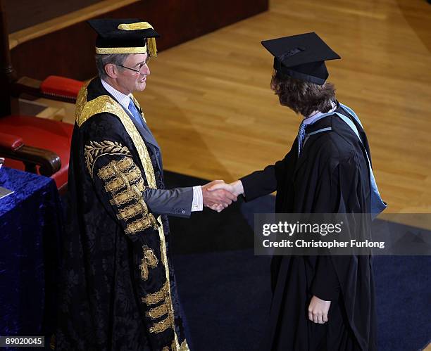 Sir Dominic Cadbury, Chancellor of The University of Birmingham, presents students with their degrees on July 14, 2009 in Birmingham, England. Over...