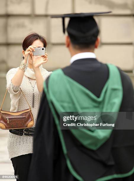 Proud students and their relatives at the University of Birmingham take part in the degree congregations on July 14, 2009 in Birmingham, England....