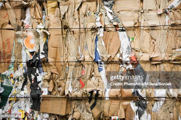 bale of flattened cardboard, full frame - bale stock pictures, royalty-free photos & images