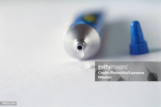 tube of glue - glue stock pictures, royalty-free photos & images
